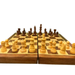Handcrafted foldable wooden chess set with storage and brass clasp made by Indian artisans