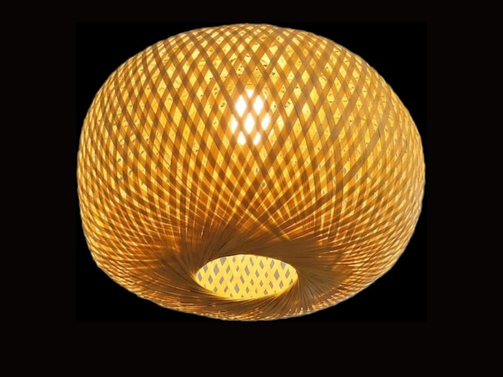Bring warm, natural charm to any room with this woven rattan pendant light. Its airy pattern casts a soft glow, creating a cozy feel for dining areas, bedrooms, and relaxed living spaces. (9)